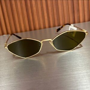 Miu Miu Gold Frame Sunglasses